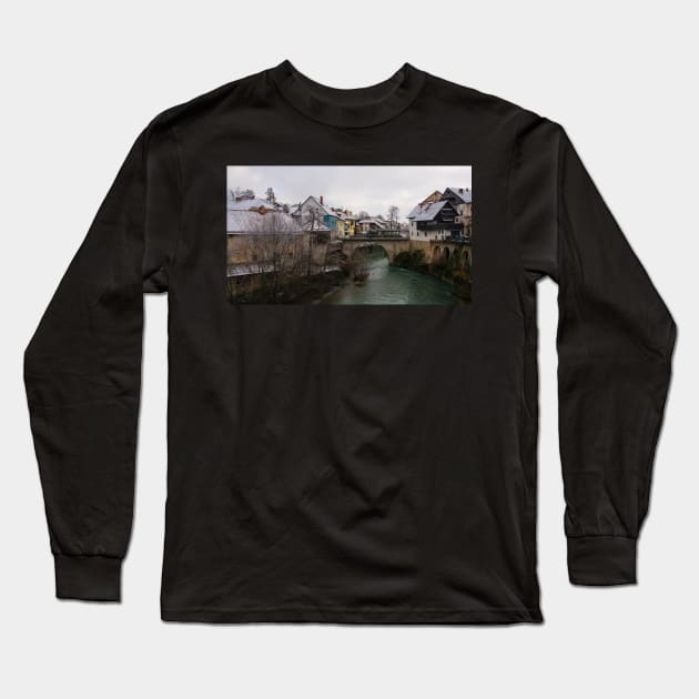 Snowy Skofja Loka in Slovenia Long Sleeve T-Shirt by jojobob